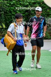 (L to R): Yuki Tsunoda (JPN) RB with Pierre Gasly (FRA) Alpine F1 Team. 19.09.2024. Formula 1 World Championship, Rd 18, Singapore Grand Prix, Marina Bay Street Circuit, Singapore, Preparation Day.