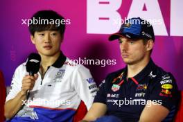 (L to R): Yuki Tsunoda (JPN) RB and Max Verstappen (NLD) Red Bull Racing in the FIA Press Conference. 23.02.2024. Formula 1 Testing, Sakhir, Bahrain, Day Three.