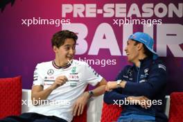 (L to R): George Russell (GBR) Mercedes AMG F1 and Alexander Albon (THA) Williams Racing in the FIA Press Conference. 22.02.2024. Formula 1 Testing, Sakhir, Bahrain, Day Two.