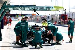 Fernando Alonso (ESP) Aston Martin F1 Team AMR24 in the pits. 21.02.2024. Formula 1 Testing, Sakhir, Bahrain, Day One.