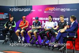 (L to R): Zhou Guanyu (CHN) Sauber; Carlos Sainz Jr (ESP) Ferrari; Sergio Perez (MEX) Red Bull Racing; Daniel Ricciardo (AUS) RB; Nico Hulkenberg (GER) Haas F1 Team; Tom Clarkson (GBR) Journalist, in the FIA Press Conference. 21.02.2024. Formula 1 Testing, Sakhir, Bahrain, Day One.