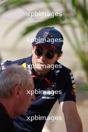 Sergio Perez (MEX) Red Bull Racing with Dr Helmut Marko (AUT) Red Bull Motorsport Consultant. 21.02.2024. Formula 1 Testing, Sakhir, Bahrain, Day One.