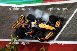 Lando Norris (GBR) McLaren MCL38 locks up under braking entering the pits. 21.02.2024. Formula 1 Testing, Sakhir, Bahrain, Day One.