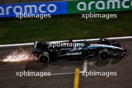 George Russell (GBR) Mercedes AMG F1 W15 sends sparks flying. 21.02.2024. Formula 1 Testing, Sakhir, Bahrain, Day One.