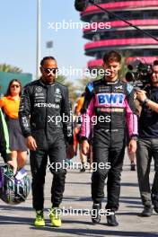 (L to R): Lewis Hamilton (GBR) Mercedes AMG F1 and Pierre Gasly (FRA) Alpine F1 Team. 21.02.2024. Formula 1 Testing, Sakhir, Bahrain, Day One.