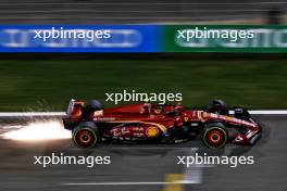 Carlos Sainz Jr (ESP) Ferrari SF-24 sends sparks flying. 21.02.2024. Formula 1 Testing, Sakhir, Bahrain, Day One.