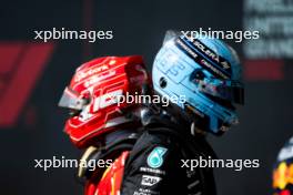 George Russell (GBR) Mercedes AMG F1 and Charles Leclerc (MON) Ferrari in parc ferme. 20.10.2024. Formula 1 World Championship, Rd 19, United States Grand Prix, Austin, Texas, USA, Race Day.