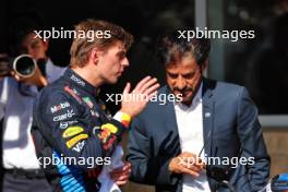 (L to R): third [placed Max Verstappen (NLD) Red Bull Racing with Mohammed Bin Sulayem (UAE) FIA President in parc ferme. 20.10.2024. Formula 1 World Championship, Rd 19, United States Grand Prix, Austin, Texas, USA, Race Day.