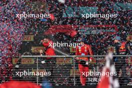 (L to R): Race winner Charles Leclerc (MON) Ferrari celebrates with Ravin Jain (GBR) Ferrari Strategy Director; Carlos Sainz Jr (ESP) Ferrari; and Max Verstappen (NLD) Red Bull Racing, on the podium. 20.10.2024. Formula 1 World Championship, Rd 19, United States Grand Prix, Austin, Texas, USA, Race Day.