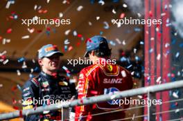 (L to R): third placed Max Verstappen (NLD) Red Bull Racing with second placed Carlos Sainz Jr (ESP) Ferrari on the podium. 20.10.2024. Formula 1 World Championship, Rd 19, United States Grand Prix, Austin, Texas, USA, Race Day.