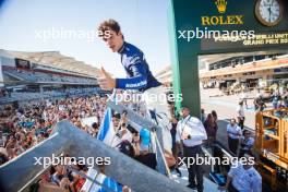 Franco Colapinto (ARG) Williams Racing celebrates with fans after the race. 20.10.2024. Formula 1 World Championship, Rd 19, United States Grand Prix, Austin, Texas, USA, Race Day.