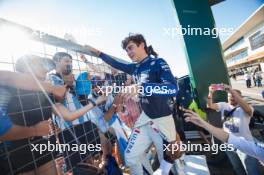 Franco Colapinto (ARG) Williams Racing celebrates with fans after the race. 20.10.2024. Formula 1 World Championship, Rd 19, United States Grand Prix, Austin, Texas, USA, Race Day.