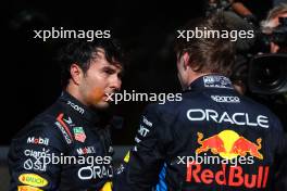 Sergio Perez (MEX) Red Bull Racing with 3rd place Max Verstappen (NLD) Red Bull Racing. 20.10.2024. Formula 1 World Championship, Rd 19, United States Grand Prix, Austin, Texas, USA, Race Day.