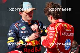 (L to R): Second placed Max Verstappen (NLD) Red Bull Racing in parc ferme with race winner Charles Leclerc (MON) Ferrari. 20.10.2024. Formula 1 World Championship, Rd 19, United States Grand Prix, Austin, Texas, USA, Race Day.