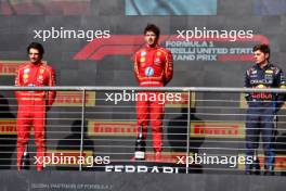 The podium (L to R): Carlos Sainz Jr (ESP) Ferrari, second; Charles Leclerc (MON) Ferrari, race winner; Max Verstappen (NLD) Red Bull Racing, third. 20.10.2024. Formula 1 World Championship, Rd 19, United States Grand Prix, Austin, Texas, USA, Race Day.