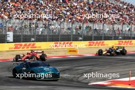 Charles Leclerc (MON) Ferrari SF-24 leads behind the Aston Martin FIA Safety Car. 20.10.2024. Formula 1 World Championship, Rd 19, United States Grand Prix, Austin, Texas, USA, Race Day.