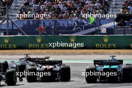 Esteban Ocon (FRA) Alpine F1 Team A524 and Lance Stroll (CDN) Aston Martin F1 Team AMR24 battle for position. 20.10.2024. Formula 1 World Championship, Rd 19, United States Grand Prix, Austin, Texas, USA, Race Day.