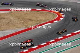 Carlos Sainz Jr (ESP) Ferrari SF-24 and Max Verstappen (NLD) Red Bull Racing RB20 battle for position. 20.10.2024. Formula 1 World Championship, Rd 19, United States Grand Prix, Austin, Texas, USA, Race Day.