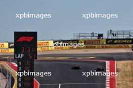 Max Verstappen (NLD) Red Bull Racing RB20 and Lando Norris (GBR) McLaren MCL38 battle for position. 20.10.2024. Formula 1 World Championship, Rd 19, United States Grand Prix, Austin, Texas, USA, Race Day.