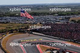 Lando Norris (GBR) McLaren MCL38 and Max Verstappen (NLD) Red Bull Racing RB20 battle for the lead at the start of the race. 20.10.2024. Formula 1 World Championship, Rd 19, United States Grand Prix, Austin, Texas, USA, Race Day.