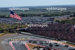 Lando Norris (GBR) McLaren MCL38 and Max Verstappen (NLD) Red Bull Racing RB20 battle for the lead at the start of the race. 20.10.2024. Formula 1 World Championship, Rd 19, United States Grand Prix, Austin, Texas, USA, Race Day.