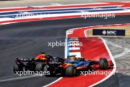 Lando Norris (GBR) McLaren MCL38 and Max Verstappen (NLD) Red Bull Racing RB20 battle for the lead at the start of the race. Formula 1 World Championship, Rd 19, United States Grand Prix, Sunday 20th October 2024. Circuit of the Americas, Austin, Texas, USA. 20.10.2024. Formula 1 World Championship, Rd 19, United States Grand Prix, Austin, Texas, USA, Race Day.