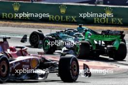 Lance Stroll (CDN) Aston Martin F1 Team AMR24 and Valtteri Bottas (FIN) Sauber C44 battle for position. 20.10.2024. Formula 1 World Championship, Rd 19, United States Grand Prix, Austin, Texas, USA, Race Day.