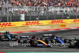 Esteban Ocon (FRA) Alpine F1 Team A524 and Alexander Albon (THA) Williams Racing FW46 battle for position. 20.10.2024. Formula 1 World Championship, Rd 19, United States Grand Prix, Austin, Texas, USA, Race Day.