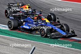 Franco Colapinto (ARG) Williams Racing FW46 and Sergio Perez (MEX) Red Bull Racing RB20 battle for position. 20.10.2024. Formula 1 World Championship, Rd 19, United States Grand Prix, Austin, Texas, USA, Race Day.