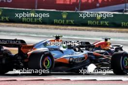 Max Verstappen (NLD) Red Bull Racing RB20 and Lando Norris (GBR) McLaren MCL38 battle for position. 20.10.2024. Formula 1 World Championship, Rd 19, United States Grand Prix, Austin, Texas, USA, Race Day.