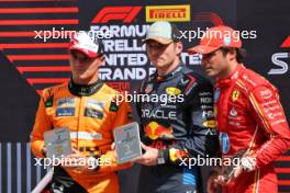 Top three in Sprint parc ferme (L to R): Lando Norris (GBR) McLaren, third; Max Verstappen (NLD) Red Bull Racing; Carlos Sainz Jr (ESP) Ferrari, third. 19.10.2024. Formula 1 World Championship, Rd 19, United States Grand Prix, Austin, Texas, USA, Sprint and Qualifying Day.