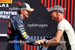 (L to R): Sprint winner Max Verstappen (NLD) Red Bull Racing celebrates with Sting (GBR) Musician in parc ferme. 19.10.2024. Formula 1 World Championship, Rd 19, United States Grand Prix, Austin, Texas, USA, Sprint and Qualifying Day.