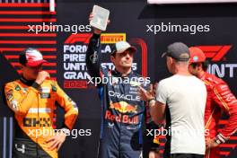 Top three in Sprint parc ferme (L to R): Lando Norris (GBR) McLaren, third; Max Verstappen (NLD) Red Bull Racing; Sting (GBR) Musician; Carlos Sainz Jr (ESP) Ferrari, third. 19.10.2024. Formula 1 World Championship, Rd 19, United States Grand Prix, Austin, Texas, USA, Sprint and Qualifying Day.