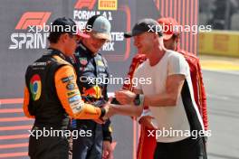 Sprint top three in parc ferme (L to R): Lando Norris (GBR) McLaren, third; Max Verstappen (NLD) Red Bull Racing, winner; Carlos Sainz Jr (ESP) Ferrari, second; Sting (GBR) Musician. 19.10.2024. Formula 1 World Championship, Rd 19, United States Grand Prix, Austin, Texas, USA, Sprint and Qualifying Day.