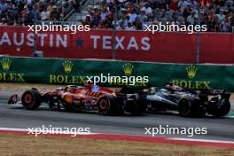 George Russell (GBR) Mercedes AMG F1 W15 and Carlos Sainz Jr (ESP) Ferrari SF-24 battle for position. 19.10.2024. Formula 1 World Championship, Rd 19, United States Grand Prix, Austin, Texas, USA, Sprint and Qualifying Day.