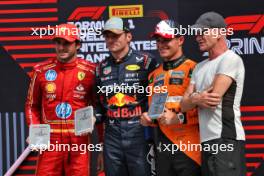 Top three in Sprint parc ferme (L to R): Lando Norris (GBR) McLaren, third; Max Verstappen (NLD) Red Bull Racing; Carlos Sainz Jr (ESP) Ferrari, third; Sting (GBR) Musician. 19.10.2024. Formula 1 World Championship, Rd 19, United States Grand Prix, Austin, Texas, USA, Sprint and Qualifying Day.