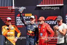 Top three in Sprint parc ferme (L to R): Lando Norris (GBR) McLaren, third; Max Verstappen (NLD) Red Bull Racing; Carlos Sainz Jr (ESP) Ferrari, third; Sting (GBR) Musician. 19.10.2024. Formula 1 World Championship, Rd 19, United States Grand Prix, Austin, Texas, USA, Sprint and Qualifying Day.