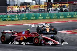 Lando Norris (GBR) McLaren MCL38 battle for position with Charles Leclerc (MON) Ferrari SF-24 behind Carlos Sainz Jr (ESP) Ferrari SF-24. 19.10.2024. Formula 1 World Championship, Rd 19, United States Grand Prix, Austin, Texas, USA, Sprint and Qualifying Day.