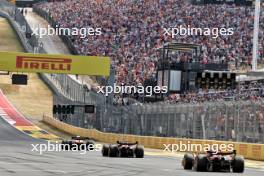 Lando Norris (GBR) McLaren MCL38 leads Carlos Sainz Jr (ESP) Ferrari SF-24 and Charles Leclerc (MON) Ferrari SF-24. 19.10.2024. Formula 1 World Championship, Rd 19, United States Grand Prix, Austin, Texas, USA, Sprint and Qualifying Day.