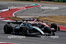 George Russell (GBR) Mercedes AMG F1 W15 and Carlos Sainz Jr (ESP) Ferrari SF-24 battle for position. 19.10.2024. Formula 1 World Championship, Rd 19, United States Grand Prix, Austin, Texas, USA, Sprint and Qualifying Day.