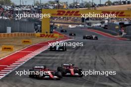 Charles Leclerc (MON) Ferrari SF-24 and team mate Carlos Sainz Jr (ESP) Ferrari SF-24 battle for position. 19.10.2024. Formula 1 World Championship, Rd 19, United States Grand Prix, Austin, Texas, USA, Sprint and Qualifying Day.