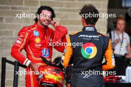 (L to R): third placed Carlos Sainz Jr (ESP) Ferrari in qualifying parc ferme with pole sitter Lando Norris (GBR) McLaren. 19.10.2024. Formula 1 World Championship, Rd 19, United States Grand Prix, Austin, Texas, USA, Sprint and Qualifying Day.