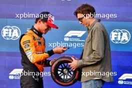 (L to R): Lando Norris (GBR) McLaren is presented the Pirelli Pole Position Award by Armand 'Mondo' Duplantis (SWE) Pole Vaulter. 19.10.2024. Formula 1 World Championship, Rd 19, United States Grand Prix, Austin, Texas, USA, Sprint and Qualifying Day.