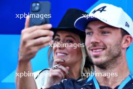 Pierre Gasly (FRA) Alpine F1 Team with Lainey Wilson (USA) Singer. 17.10.2024. Formula 1 World Championship, Rd 19, United States Grand Prix, Austin, Texas, USA, Preparation Day.