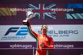 Race winner Oliver Bearman (GBR) Prema Racing celebrates on the podium. 29.06.2024. FIA Formula 2 Championship, Rd 7, Sprint Race, Spielberg, Austria, Saturday.