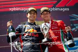 The podium (L to R): Josep Maria Marti (ESP) Campos Racing, second; Oliver Bearman (GBR) Prema Racing, race winner. 29.06.2024. FIA Formula 2 Championship, Rd 7, Sprint Race, Spielberg, Austria, Saturday.