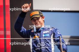 Franco Colapinto (ARG) MP Motorsport celebrates his second position on the podium. 30.06.2024. FIA Formula 2 Championship, Rd 7, Feature Race, Spielberg, Austria, Sunday.