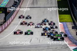 Joshua Durksen (PAR) AIX Racing leads at the start of the race. 30.06.2024. FIA Formula 2 Championship, Rd 7, Feature Race, Spielberg, Austria, Sunday.