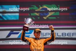 Race winner Gabriel Bortoleto (BRA) Invicta Racing celebrates on the podium. 30.06.2024. FIA Formula 2 Championship, Rd 7, Feature Race, Spielberg, Austria, Sunday.