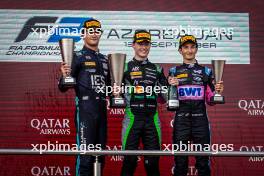 The podium (L to R): Jak Crawford (USA) Dams, second; Joshua Durksen (PAR) AIX Racing, race winner; Gabriele Mini (ITA) Prema Racing, third. 14.09.2024. FIA Formula 2 Championship, Rd 12, Sprint Race, Baku, Azerbaijan, Saturday.